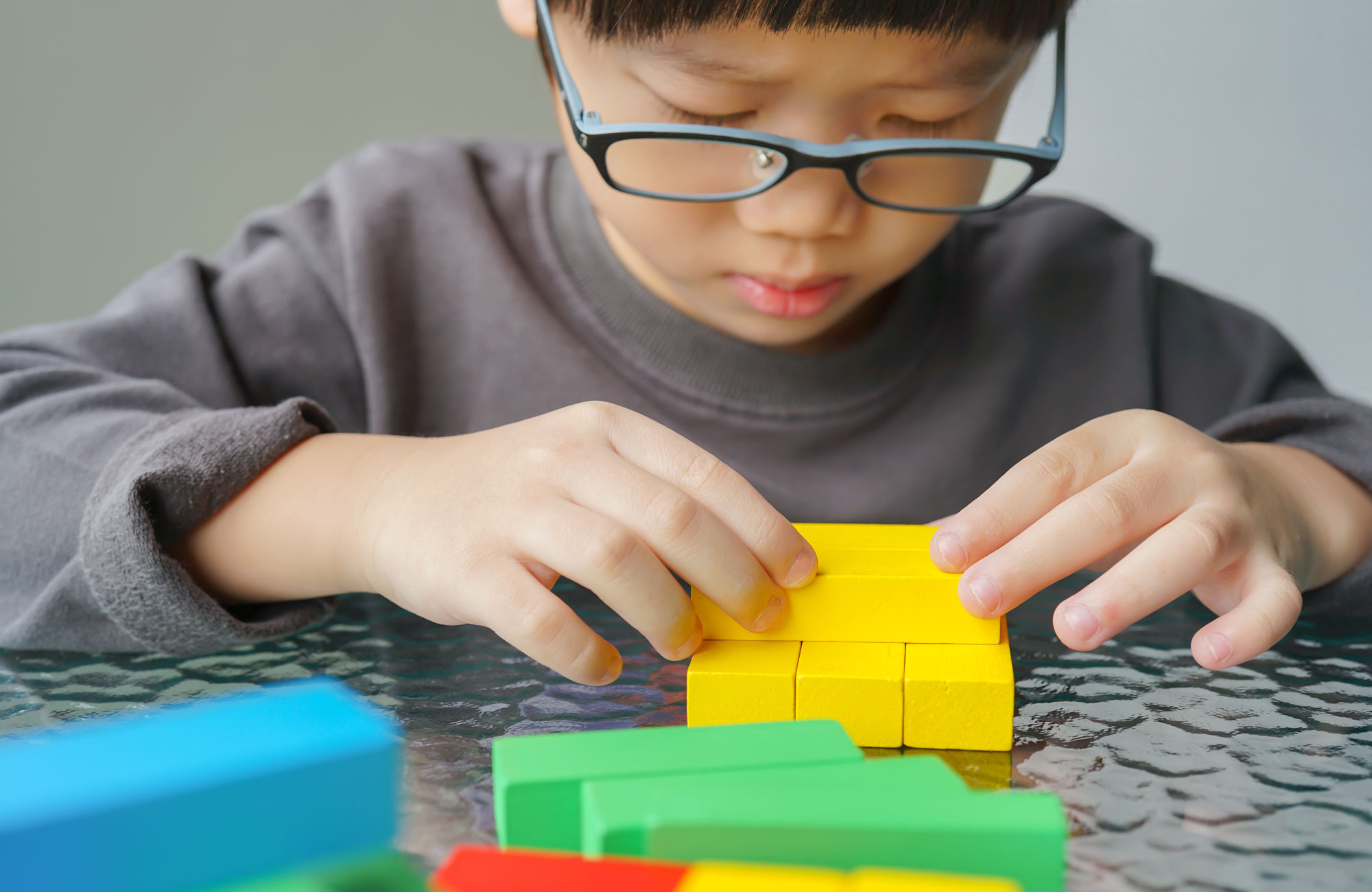 Asian-kid-wearing-glasses